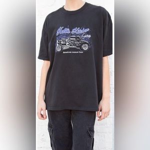 Brandy Melville Hells Kitchen Garage Oversized T-Shirt In  Black - Oversized
